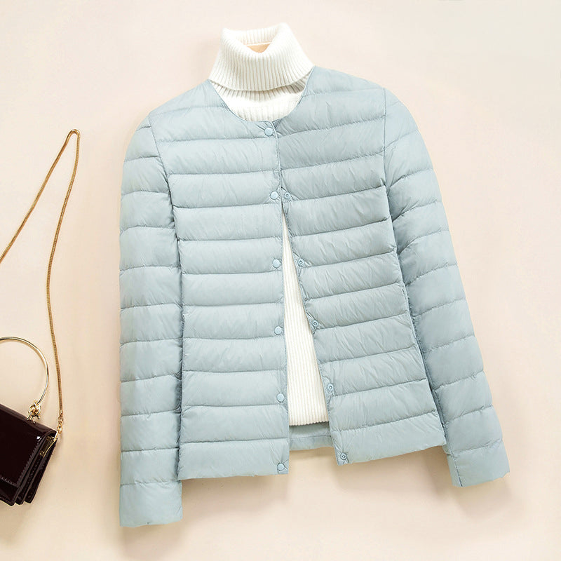 Lumina Wear Serena lightweight quilted puffer jacket with snap button closure, stylish down jacket for cold weather.