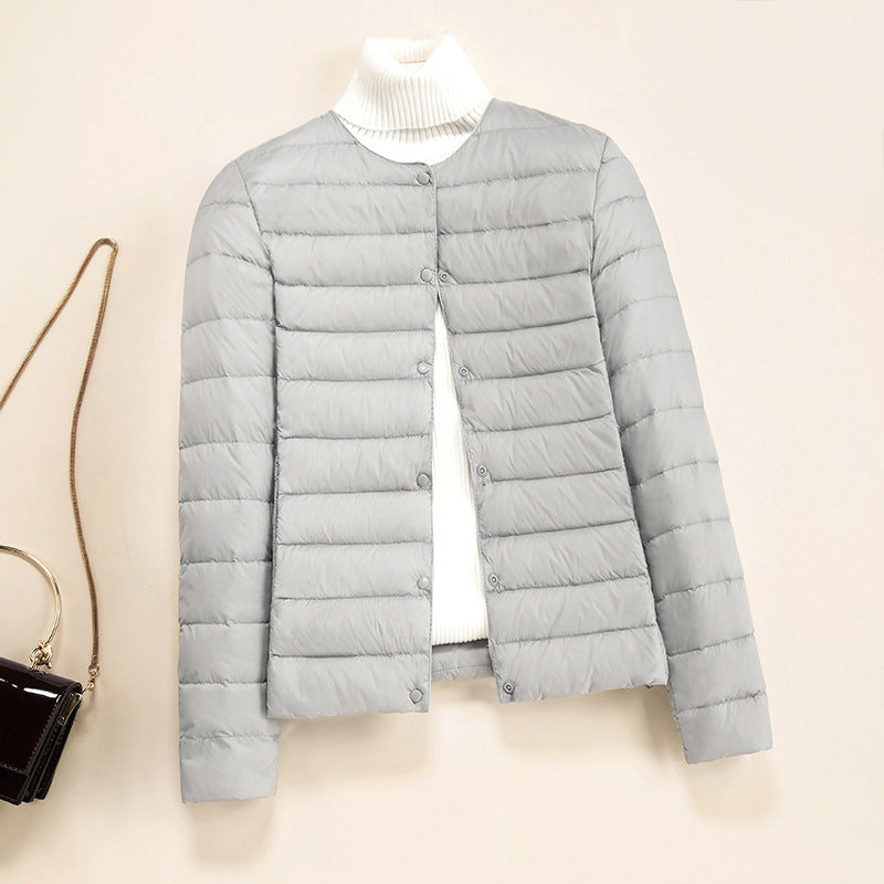 Lumina Wear Serena lightweight quilted puffer jacket with snap button closure, stylish down jacket for cold weather.