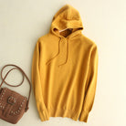 Lumina Wear Serena lightweight soft knit relaxed hoodie with adjustable drawstrings, shown in a casual, comfortable fit.
