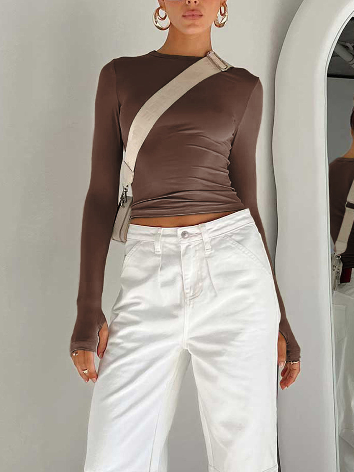 Lumina Wear Serena sleek modern crop top with versatile styling, shown in a flattering fit and contemporary design.