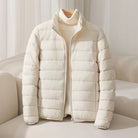 Lumina Wear Silva pastel lightweight insulated jacket with a high collar, perfect for cold weather and stylish outdoor wear.