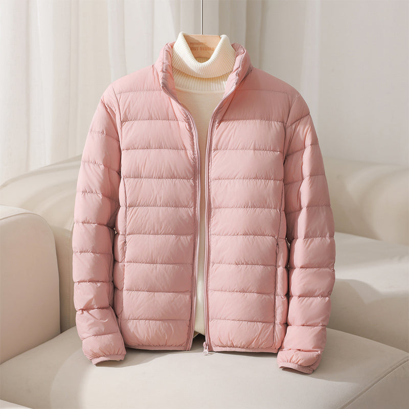 Lumina Wear Silva pastel lightweight insulated jacket with high collar, designed for warmth and comfort.