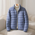 Silva Lumina Wear pastel lightweight insulated jacket with high collar, ideal for cold weather and casual outdoor wear.