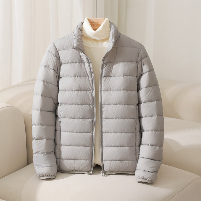 Silva Lumina pastel lightweight insulated high collar jacket featuring a cozy high collar and sleek design for outdoor wear.