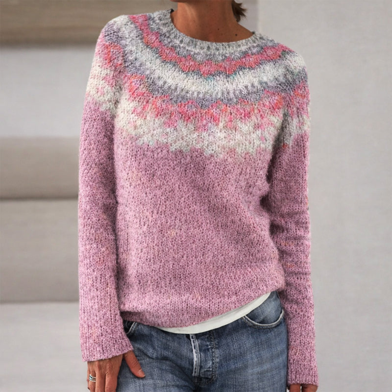 Sofia Amoretti Lumina knit sweater with patterned design, relaxed fit crewneck, soft fabric, and ribbed cuffs in neutral tones.
