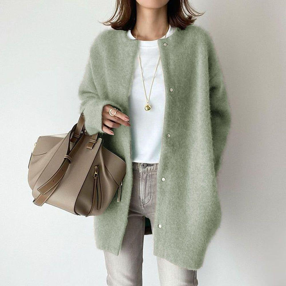 Women's relaxed fit wool cardigan with suede accents by Lumina Wear, shown in a cozy, stylish design.