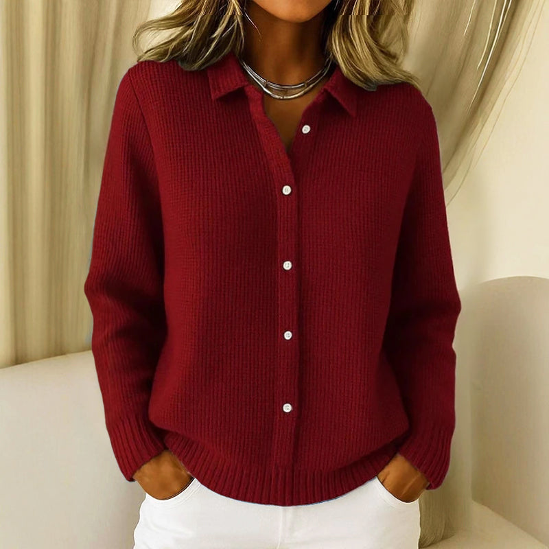 Lumina Wear Sofia collared knit cardigan with button-up front and clean closure, stylishly displayed on a hanger.