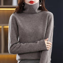 Lumina Wear Sofia cozy loose-fit sweater for women with stacked collar, soft knit fabric, and relaxed style.
