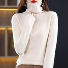 Lumina Wear Sofia cozy loose-fit sweater with a stacked collar, shown in a relaxed fit and soft fabric, ideal for casual wear.
