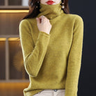 Lumina Wear Sofia cozy loose-fit sweater with a stacked collar, worn by a woman, showcasing soft knit fabric and relaxed style.