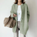 Sofia cozy relaxed fit wool cardigan with suede accents by Lumina Wear, shown in soft knit fabric with button closure and front pockets.