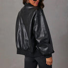 Sofia edgy faux leather jacket with sleek band collar by Lumina Wear, featuring stylish design and modern silhouette.