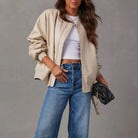 Sofia faux leather jacket with sleek band collar from Lumina Wear, featuring edgy design and fitted style.