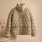 Elegant Lumina Wear Sofia insulated women's jacket in broadcloth with double-breasted design, perfect for cold weather.