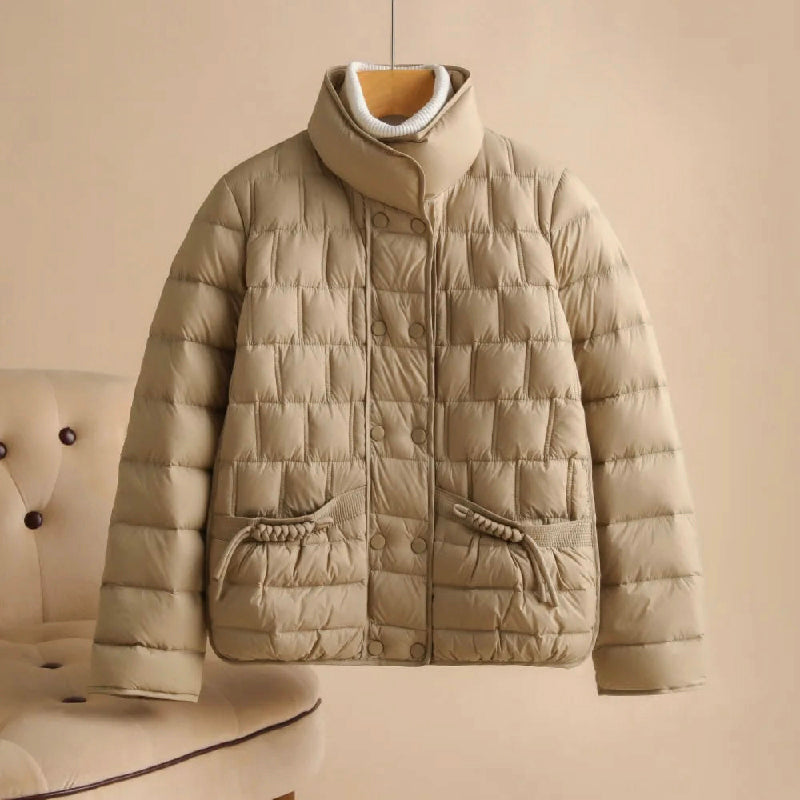Elegant Lumina Wear Sofia insulated women's jacket in broadcloth with double-breasted design, perfect for cold weather.