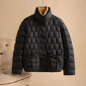 Elegant Lumina Wear Sofia double-breasted insulated women's jacket in broadcloth, shown in a stylish, fitted design.