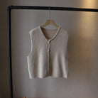 Elegant knitted women's sweater vest by Lumina Wear, featuring a stylish layered design for versatile women's fashion.