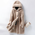 Luxurious plush oversized teddy coat with hood and large buttons by Lumina Wear, featuring a cozy, soft fabric and stylish design.