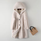 Lumina Wear Sofia plush oversized teddy coat with hood and large buttons, cozy women's winter coat in soft faux fur.