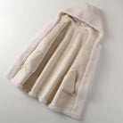 Lumina Wear Sofia plush oversized teddy coat with hood and large buttons, cozy women's winter coat in soft fabric.