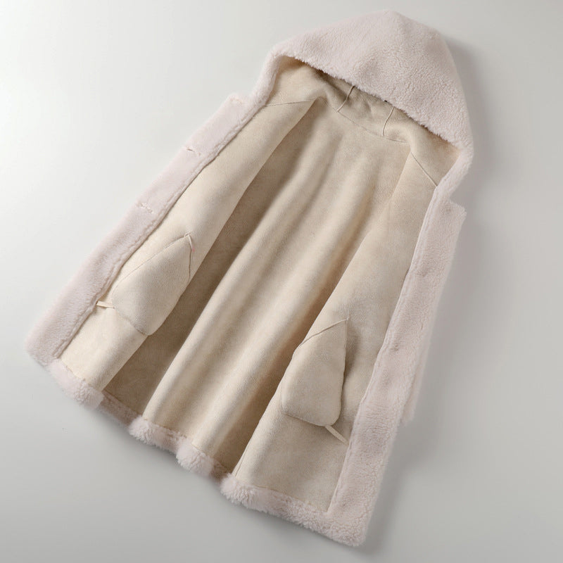 Lumina Wear Sofia plush oversized teddy coat with hood and large buttons, cozy women's winter coat in soft fabric.