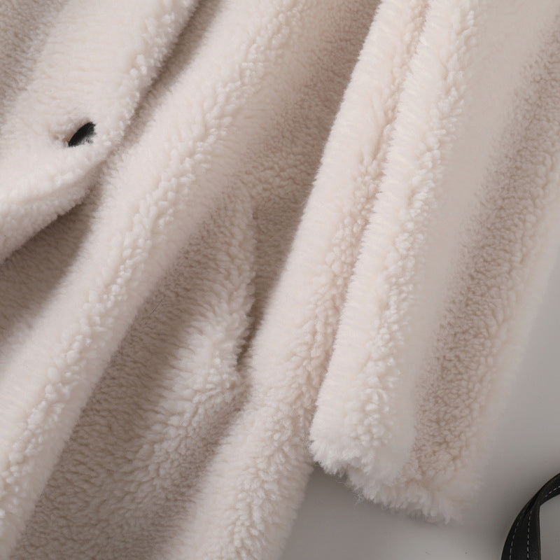 Lumina Wear Sofia plush oversized teddy winter coat with hood, featuring soft fabric and cozy design for women.