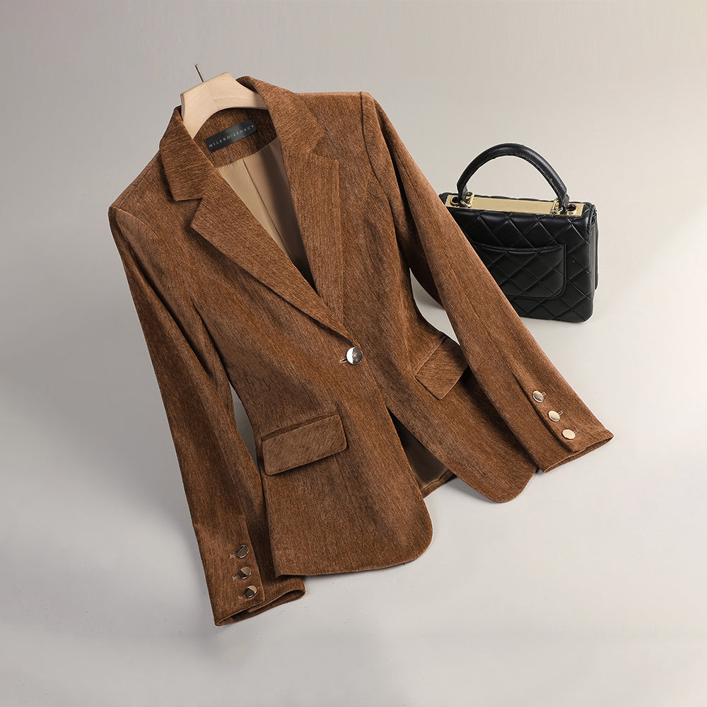 Slim tailored velvet blazer for women with radiant texture, in deep color, by Lumina Wear, showcased on a model.