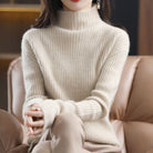 Lumina Wear Sofia striped oversized turtleneck sweater for women, featuring cozy knit and relaxed fit for casual comfort.