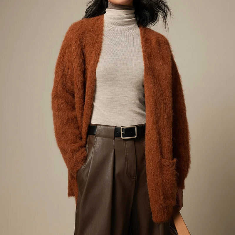 Light beige Lumina Wear Sofia ultra soft breathable loose fit women's cardigan sweater draped on a mannequin.