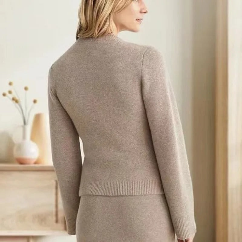 Vintage-inspired Lumina Wear Sofia cardigan with elegant buttons and side pockets, soft knit, in a classic design.