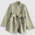 Valentina beige tailored blazer with belted waist and elegant lapel by Lumina Wear, styled with long sleeves and classic fit.