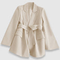 Valentina chic tailored belted blazer with elegant lapel by Lumina Wear, shown on a hanger with a neutral background.