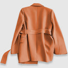 Lumina Wear Valentina women's blazer with tailored fit, belt, and elegant lapel, styled for sophisticated office or casual wear.