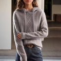 Lumina Wear Valentina cozy cable-knit hooded sweater with relaxed fit, featuring a textured knit and casual style.