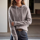 Valentina cozy cable-knit hooded sweater with relaxed fit from Lumina Wear, featuring a soft knit texture and a casual, comfortable style.