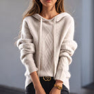 Valentina cozy cable-knit hooded sweater with relaxed fit by Lumina Wear, featuring a warm, textured knit and casual style.