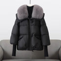 Black puffer jacket with fur collar by Lumina Wear, featuring an extended length and stylish winter design.