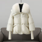 Black extended-length puffer jacket with fur collar by Lumina Wear, featuring a stylish winter design and quilted insulation.