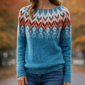Multicolor Nordic-inspired knit sweater named Valentina by Lumina Wear, featuring bold patterns and cozy winter style.