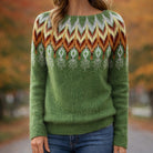 Valentina Lumina Wear Nordic-inspired multicolor knit sweater with bold geometric pattern, featuring cozy, vibrant wool yarns.