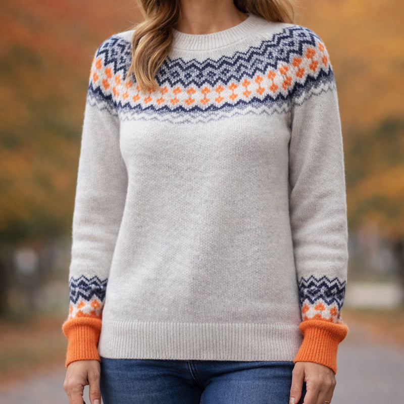 Multicolor Nordic-inspired knit sweater with bold pattern from Lumina Wear, featuring intricate design and cozy fabric.