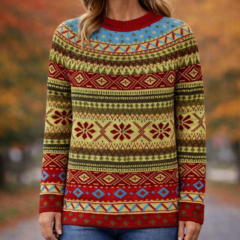Valentina Lumina Wear Nordic-inspired multicolor knit sweater with bold geometric pattern, featuring cozy, colorful yarns and classic fit.
