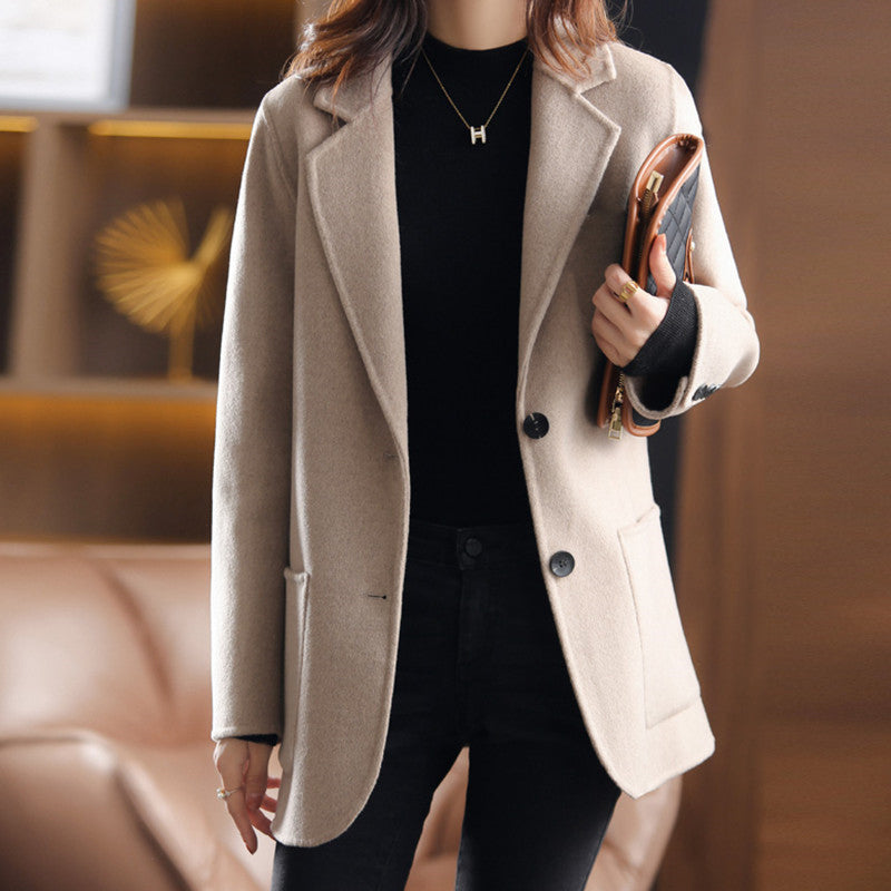 Valentina Lumina Relaxed Fit Wool Blend Winter Overcoat with Lapel Collar, stylish outerwear for cold weather, in neutral tones.
