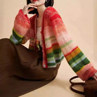 Light gray gradient knit cardigan with playful buttons from Lumina Wear, styled in a relaxed fit.