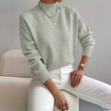 Lumina Wear Valentina relaxed mock neck knit sweater with ribbed cuffs, soft and cozy for casual wear.