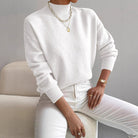 Lumina Wear Valentina relaxed mock neck knit sweater with ribbed cuffs, shown in a cozy, casual fit in a neutral color.