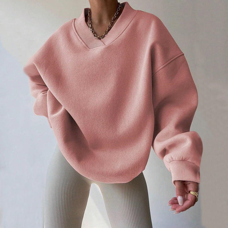 Light pastel oversized Lumina Wear Valentina sweater with relaxed fit and V-neckline, perfect for casual and cozy outfits.