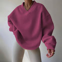 Light pastel oversized Lumina Wear Valentina sweater with a relaxed fit and V-neckline, displayed on a neutral background.