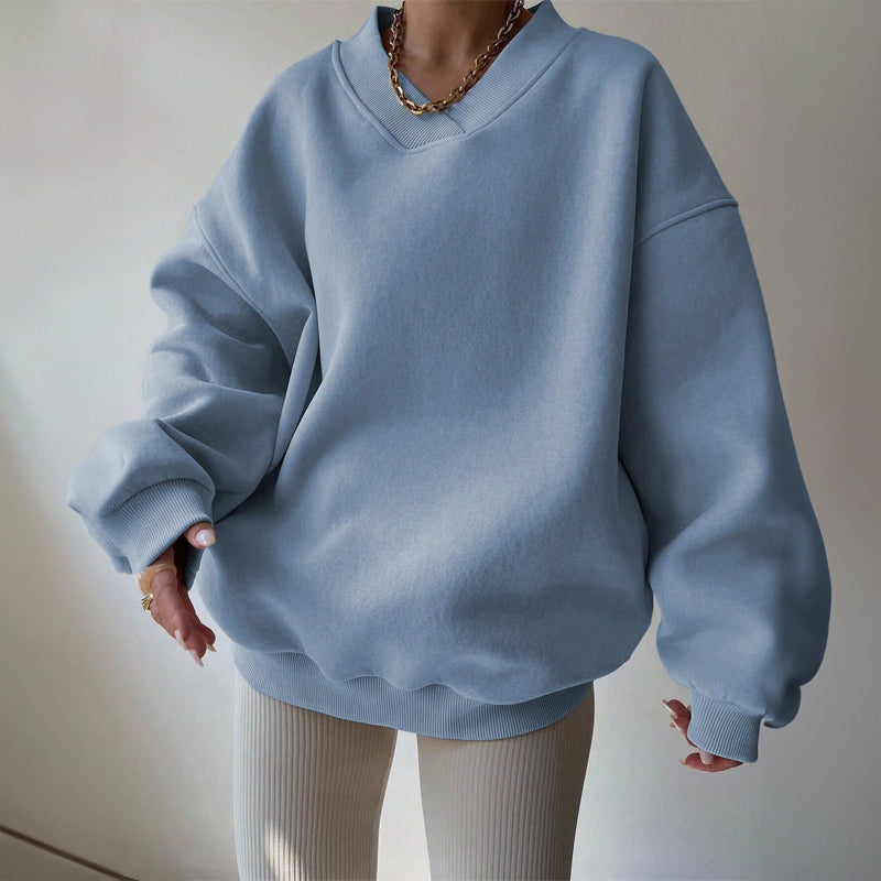 Light pink Valentina oversized pastel sweater with V-neckline by Lumina Wear, relaxed fit, cozy and stylish for casual wear.