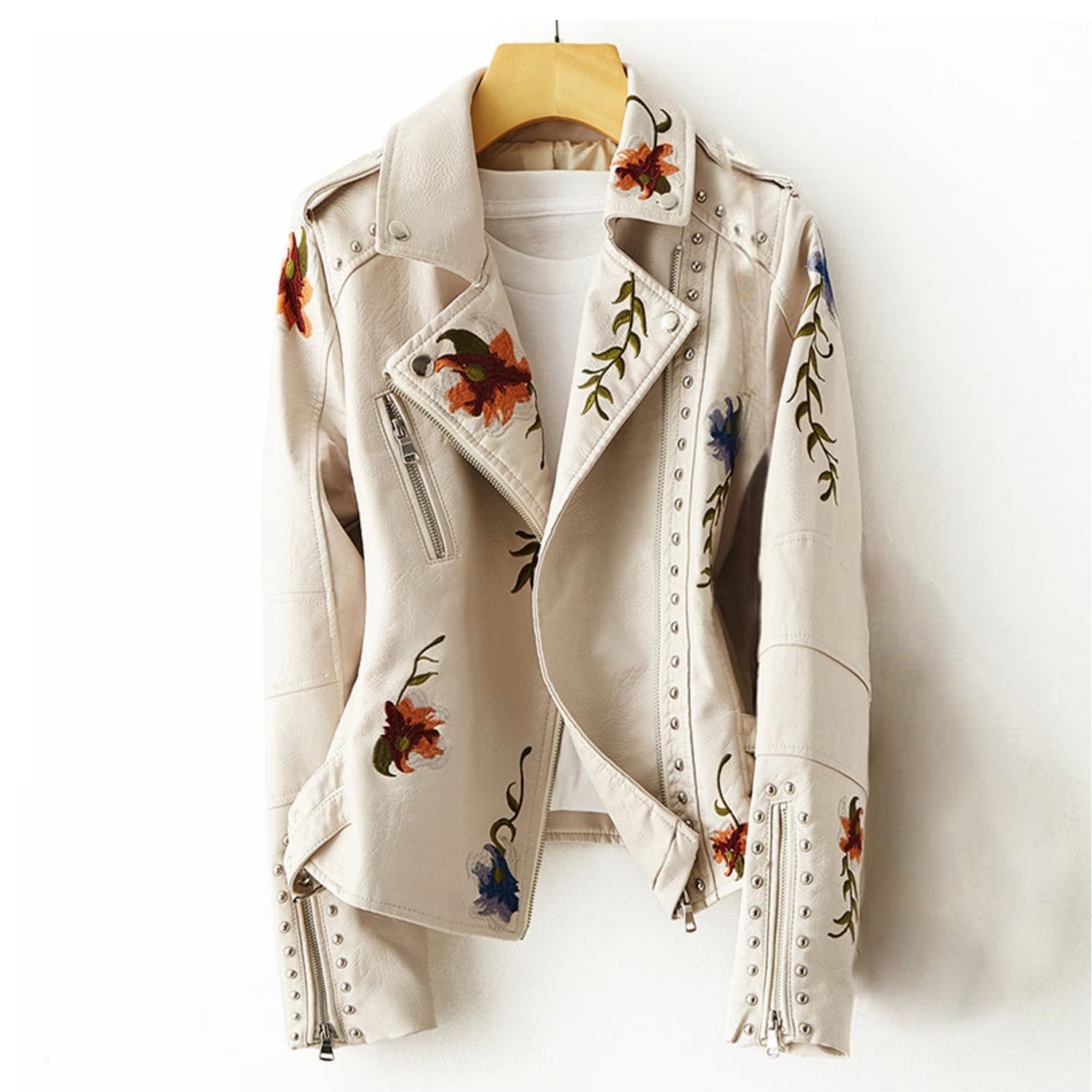 Valentina retro floral embroidered vegan leather jacket with stud accents by Lumina Wear, featuring colorful floral embroidery and stud details.
